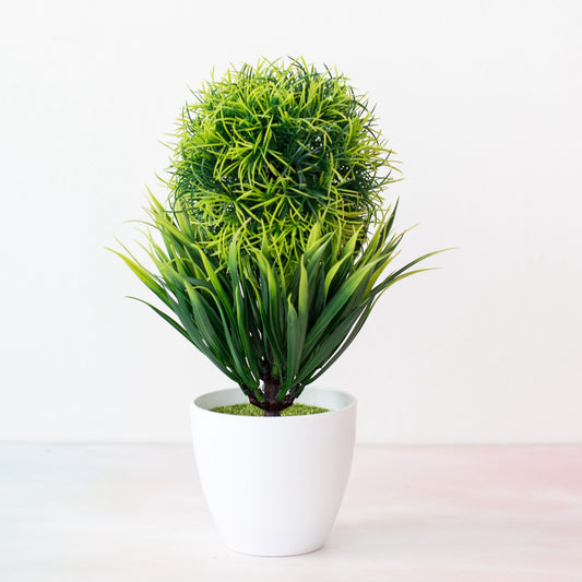 Maceta con planta artificial