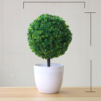 Maceta con planta artificial