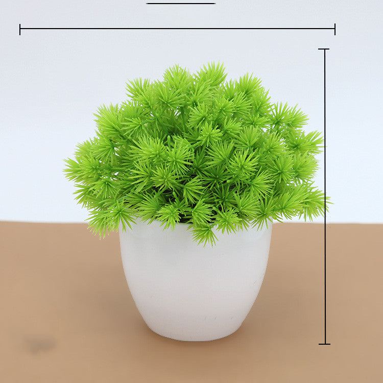 Maceta con planta artificial