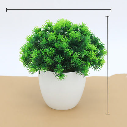 Maceta con planta artificial